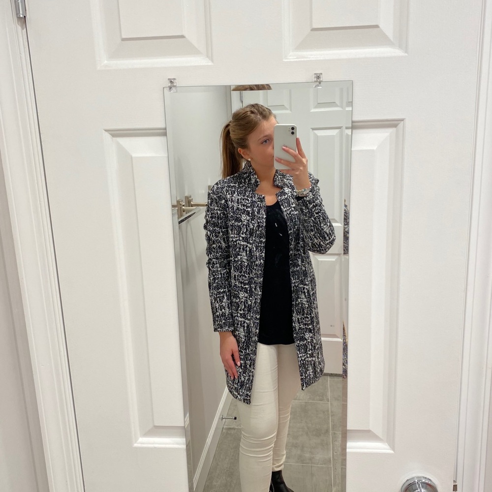 Black and white speckled car coat